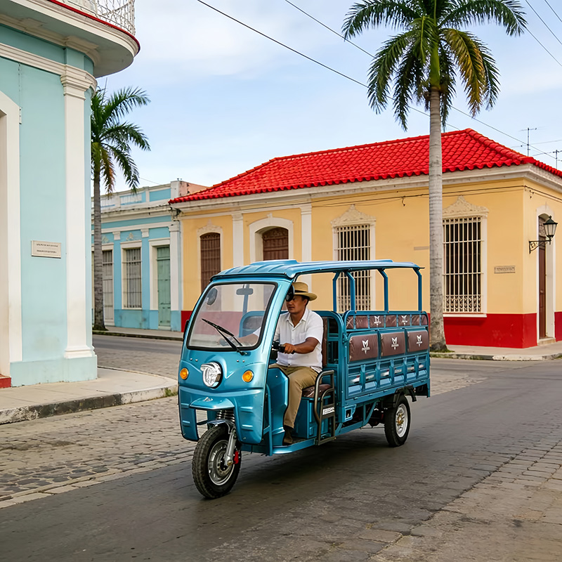 Triciclo eléctrico de pasajeros y carga